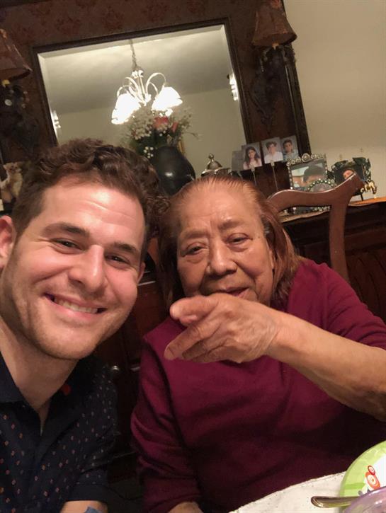 A man and woman smiling at camera