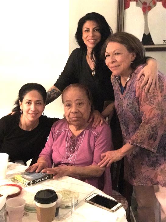 A group of women posing for a photo