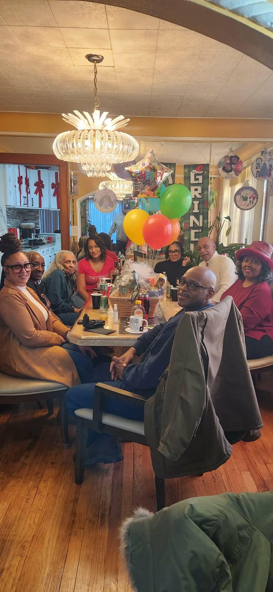 A group of people sitting at a table