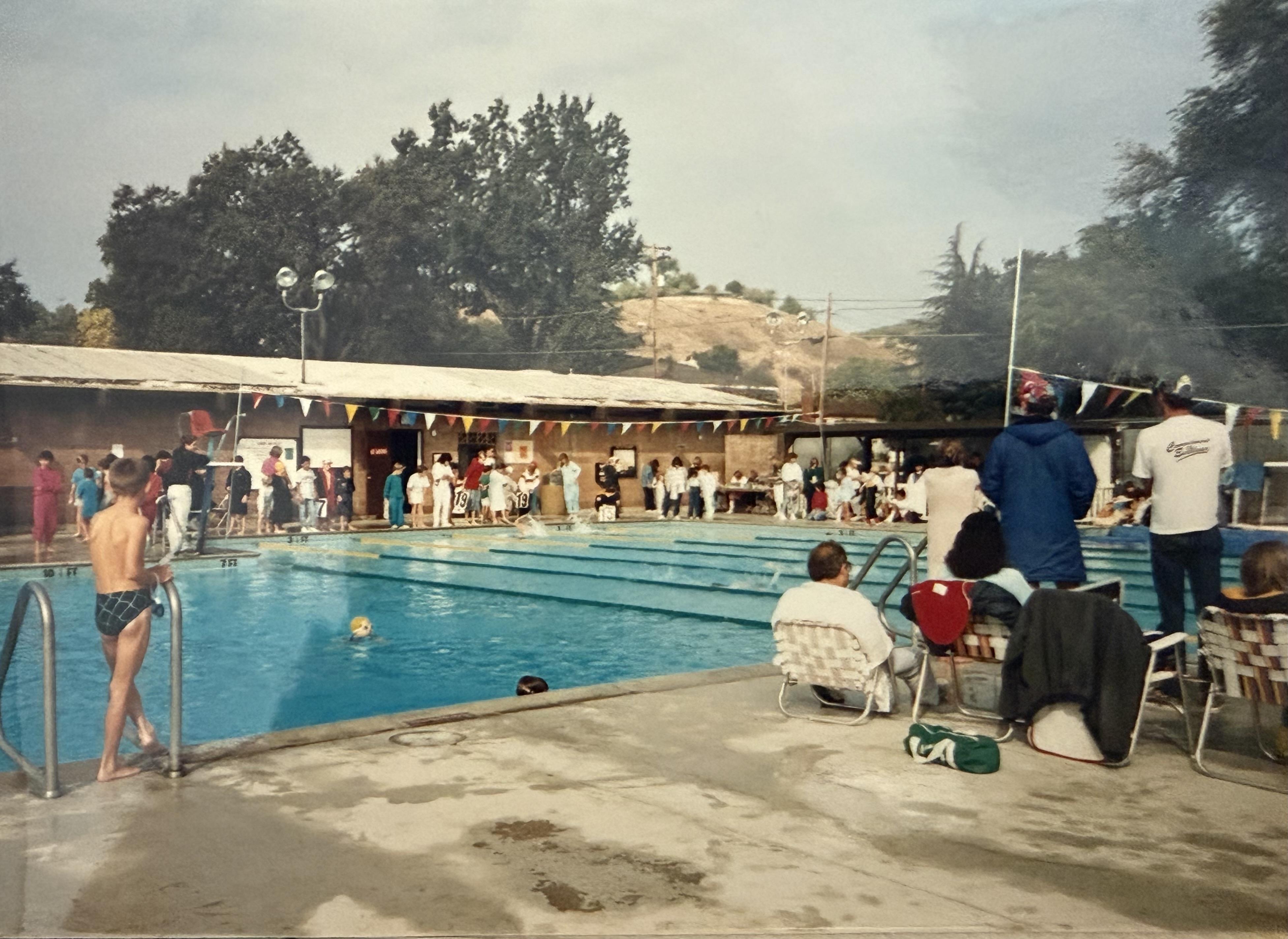 A group of people at a swimming pool