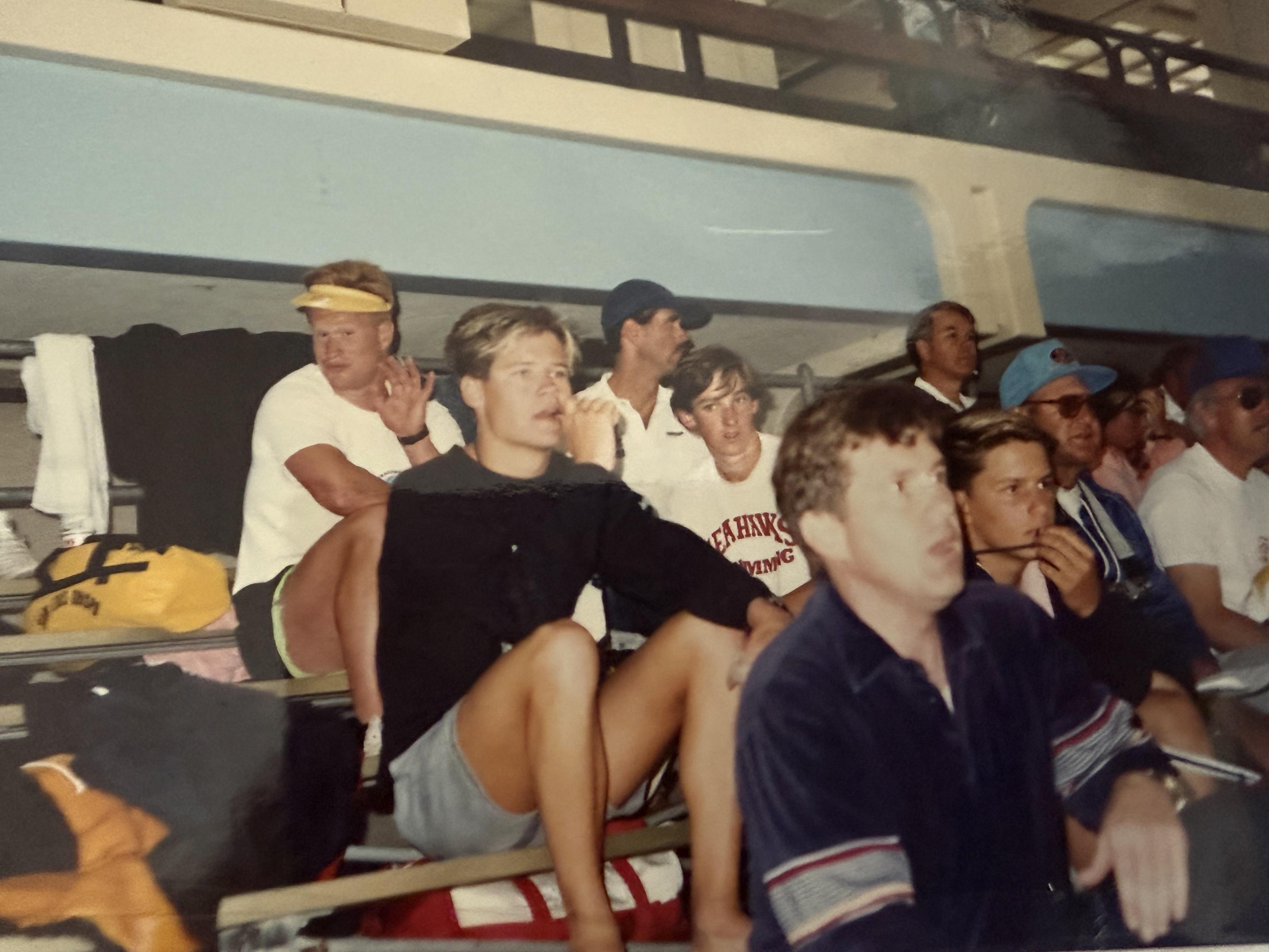 A group of people sitting on a bus