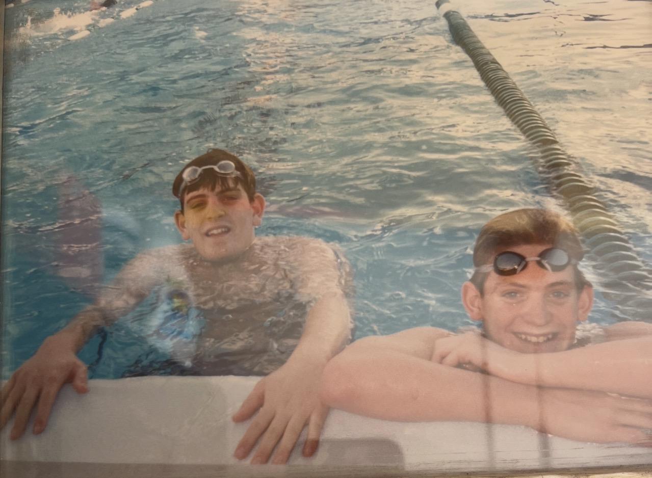 A group of boys in a pool