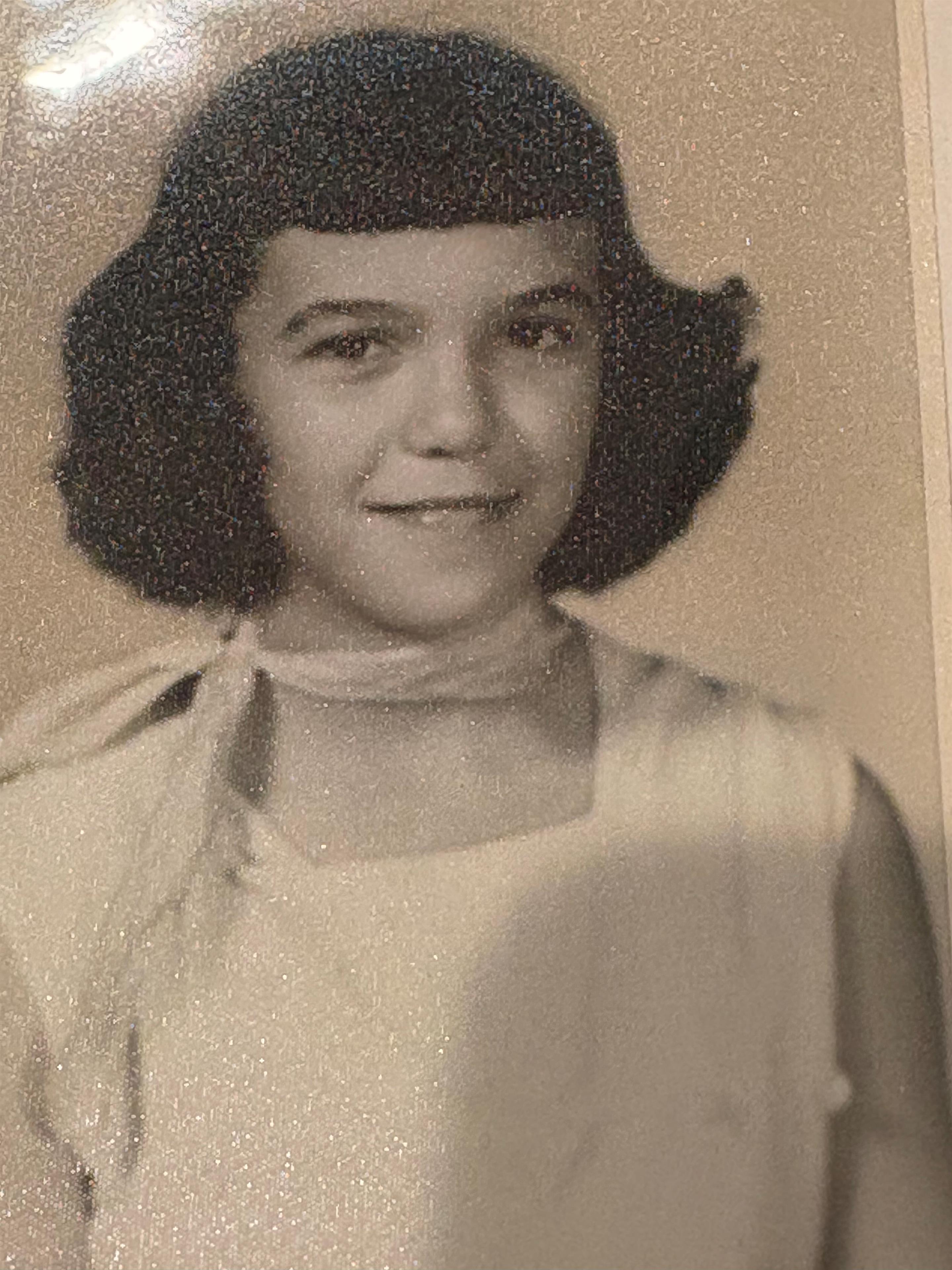 A black and white photo of a girl