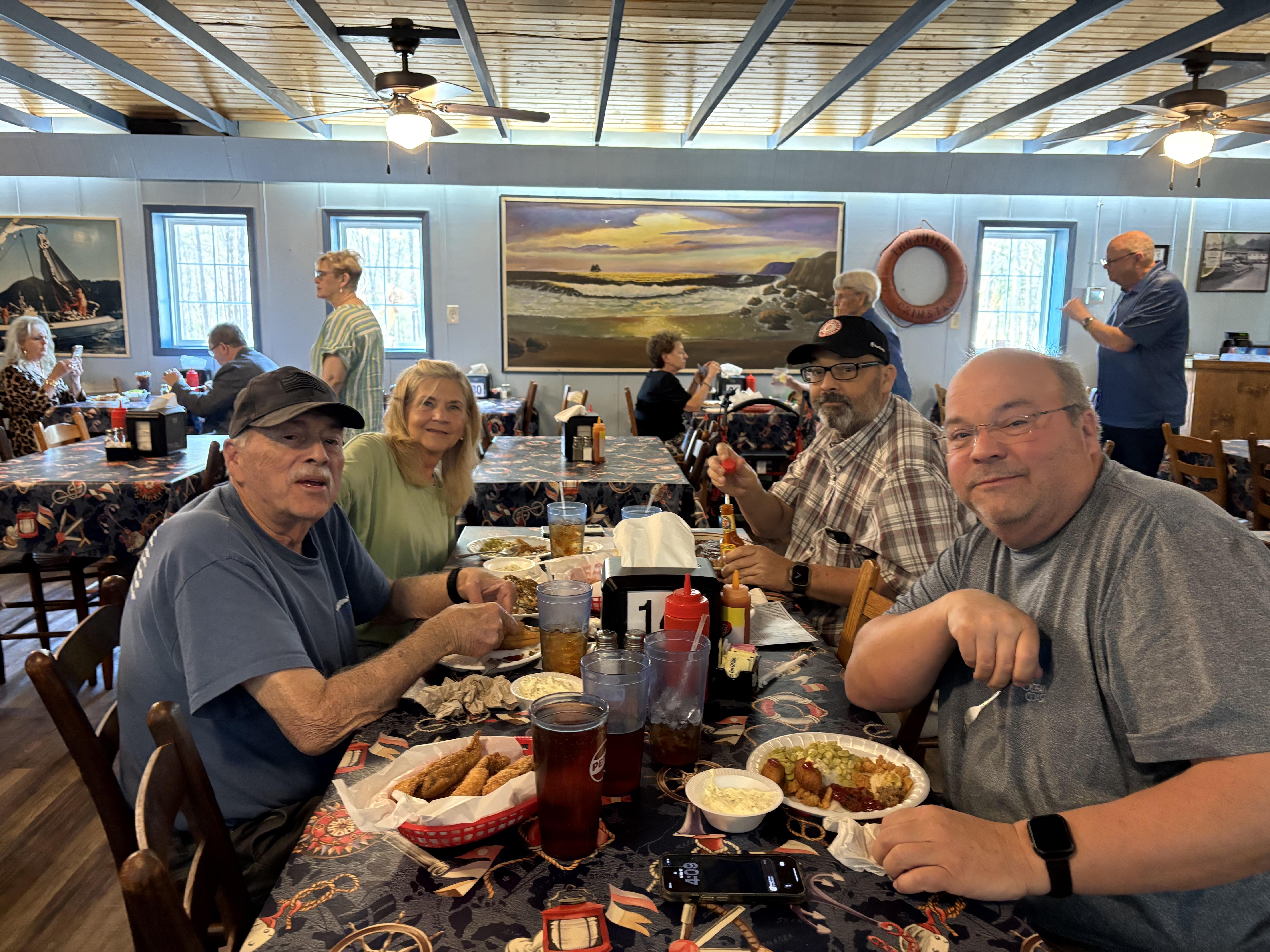 A group of people sitting at a table