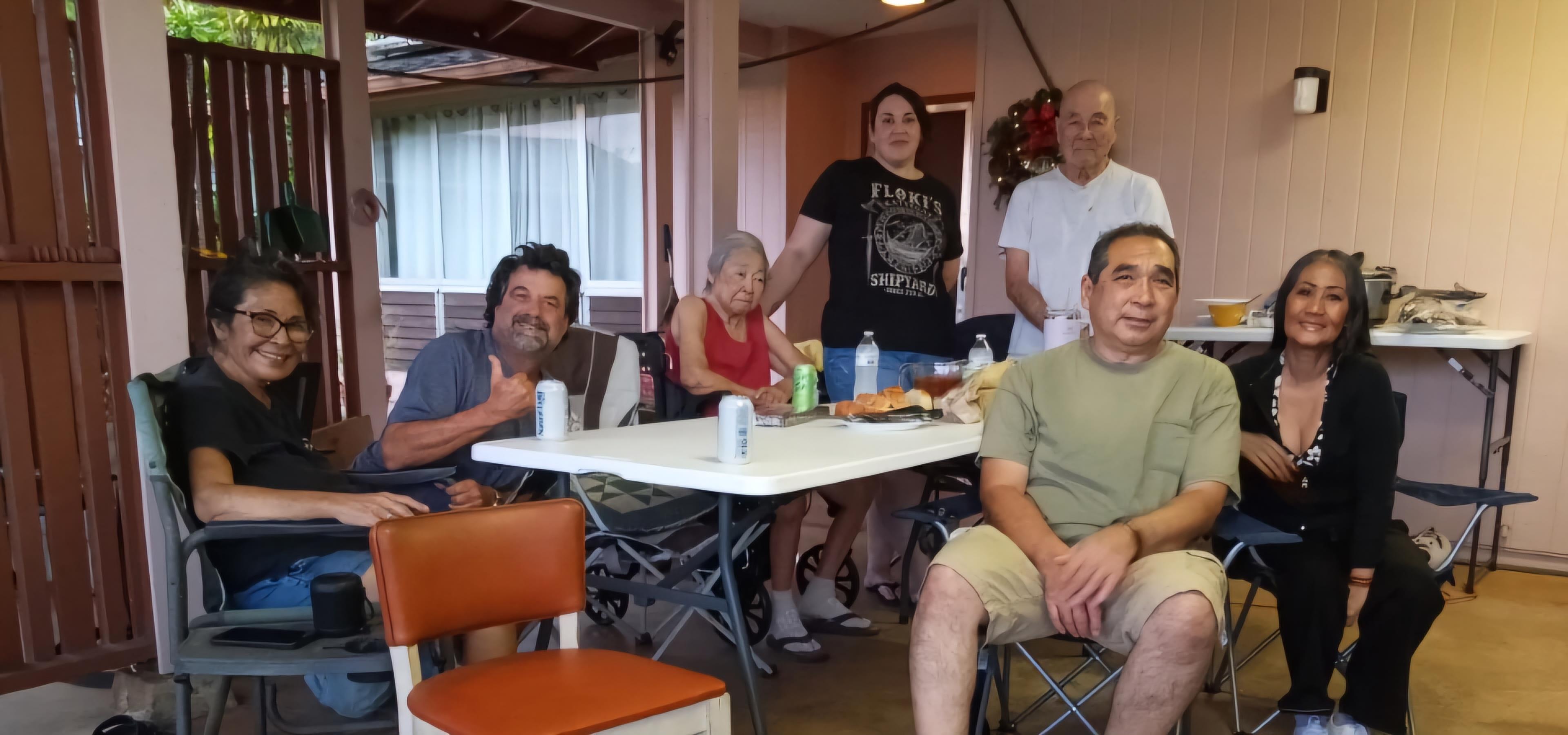 A group of people sitting at a table