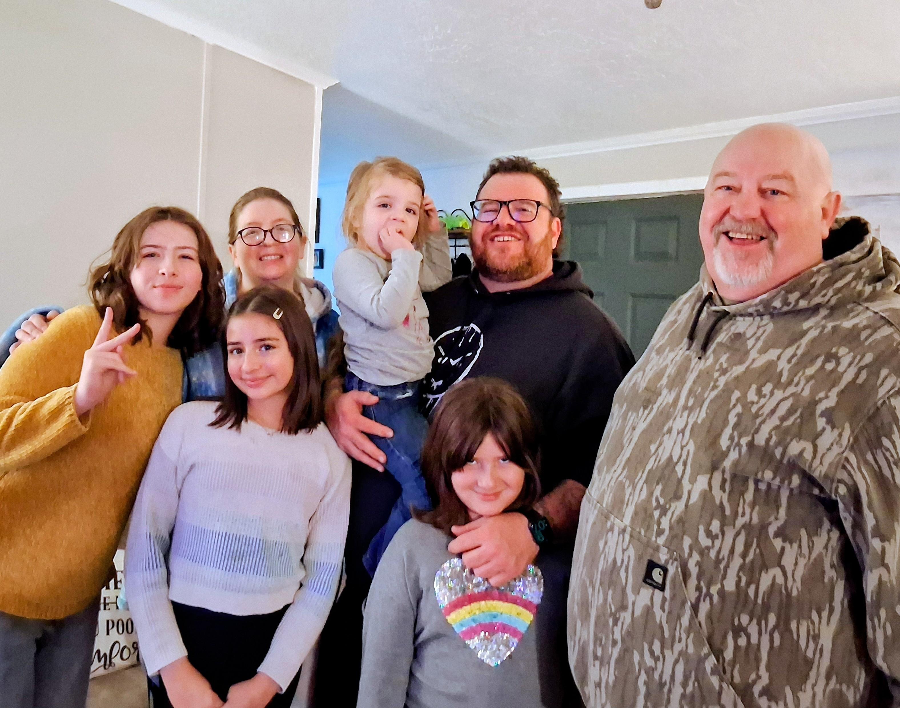 A group of people posing for a photo