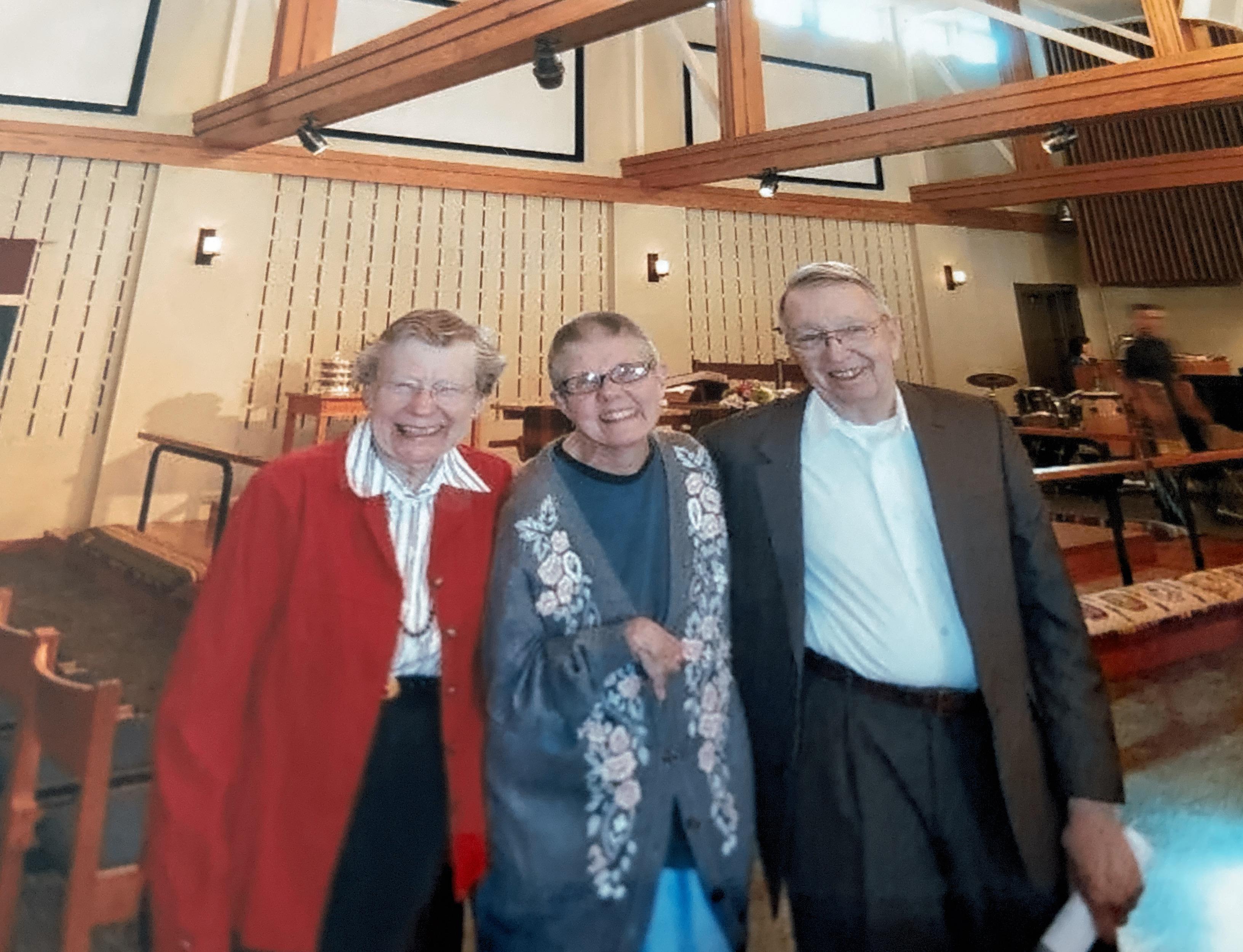 A group of old people standing together