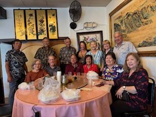 A group of people posing for a photo
