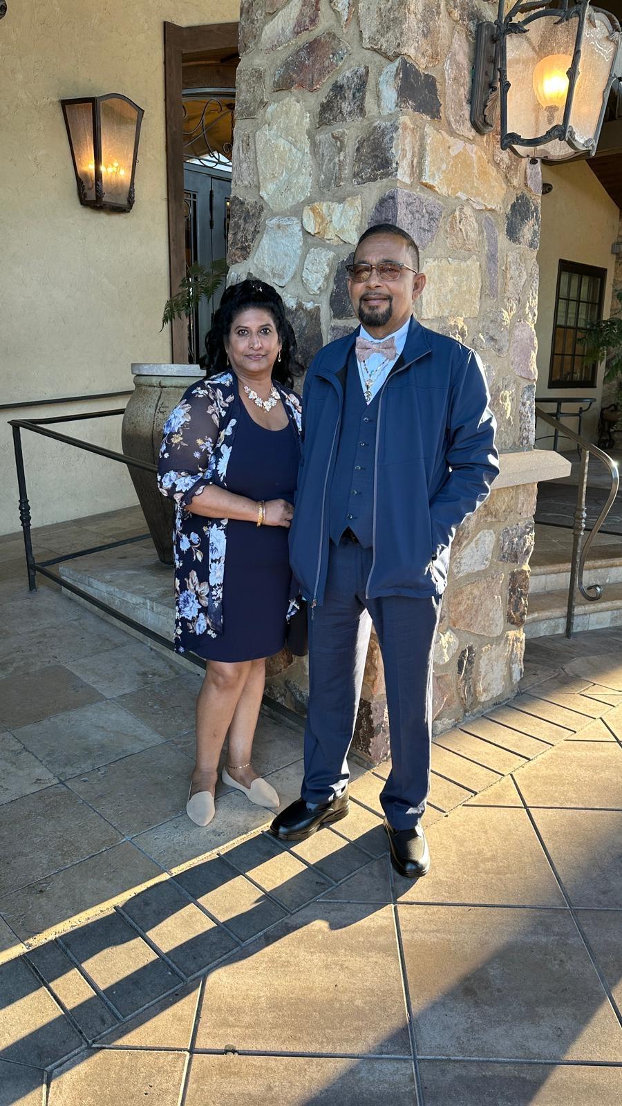 A man and woman standing next to each other