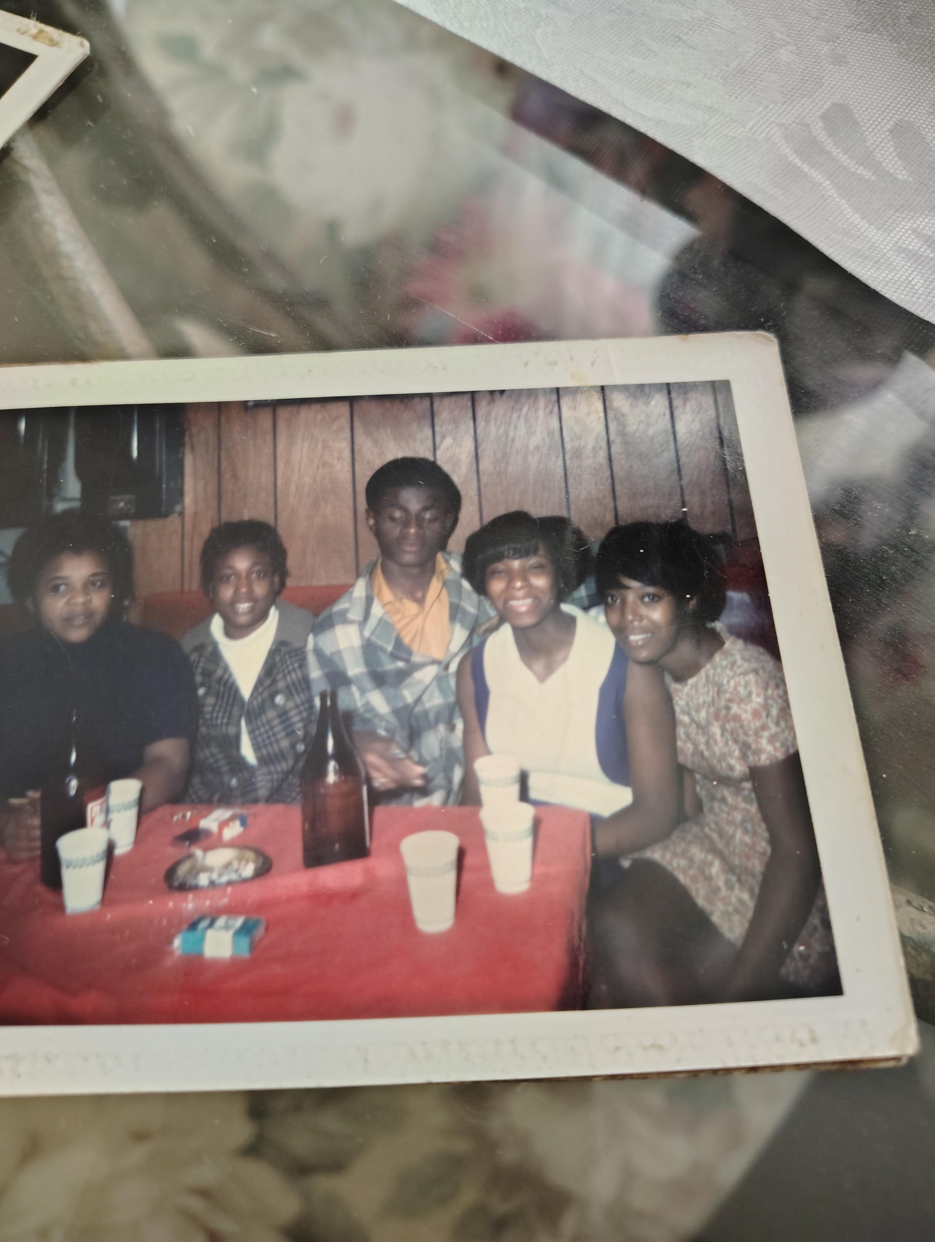 A group of people sitting at a table
