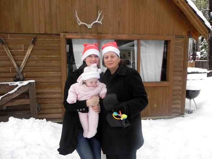 A group of women with a baby in a snowy area