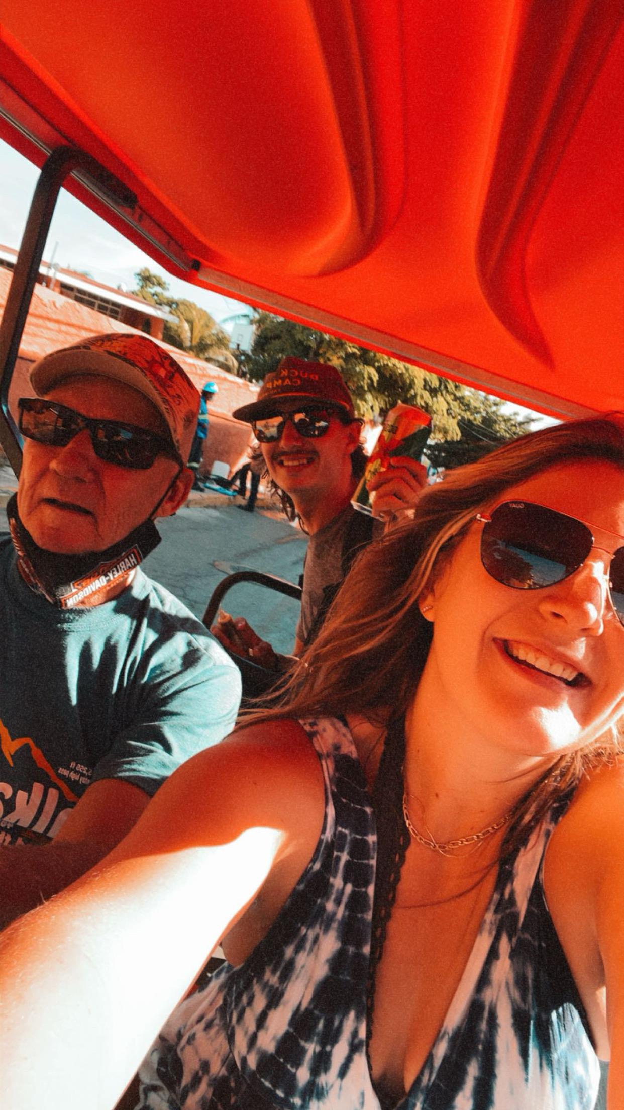 A group of people taking a selfie
