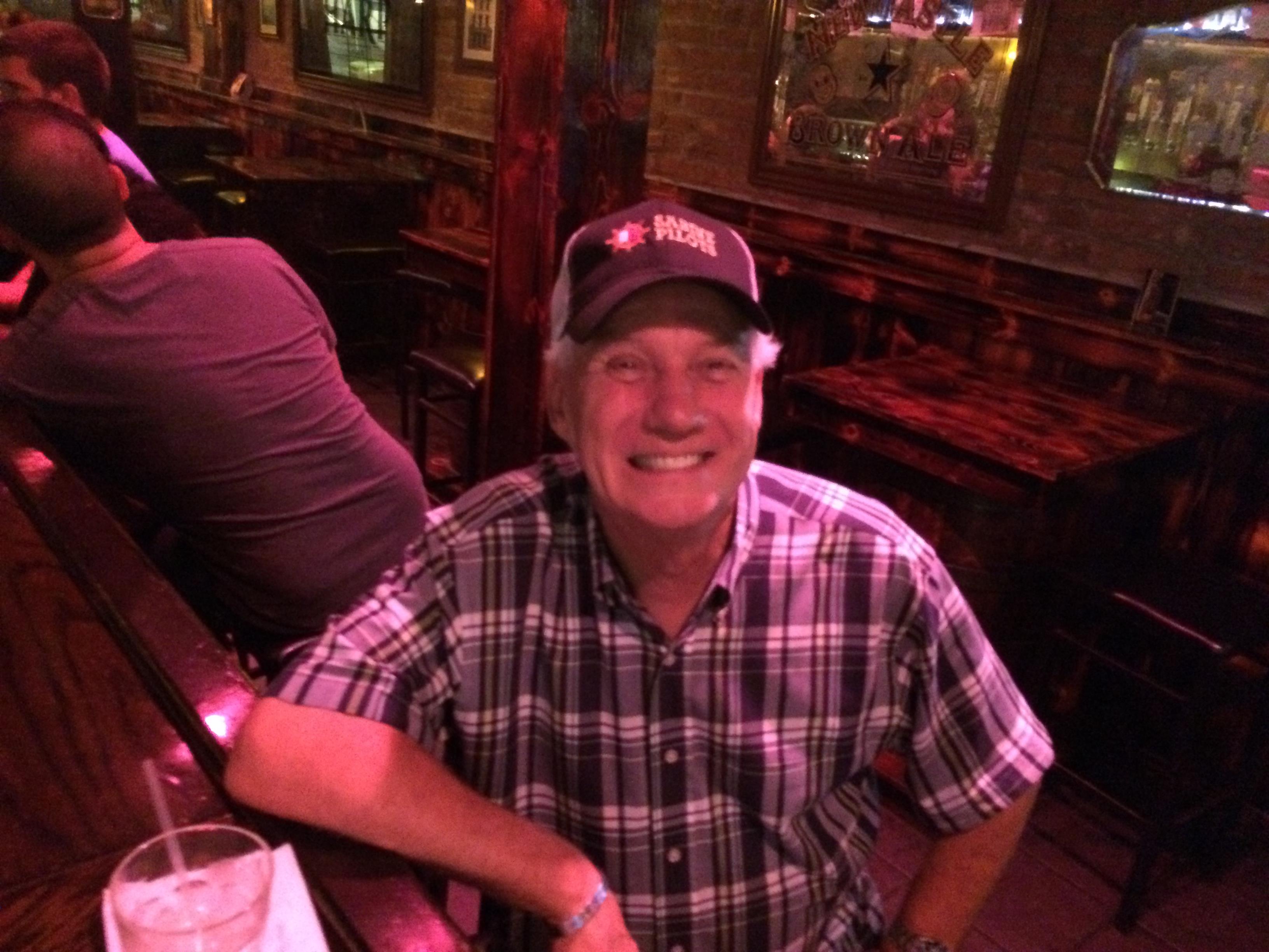 A man sitting at a bar