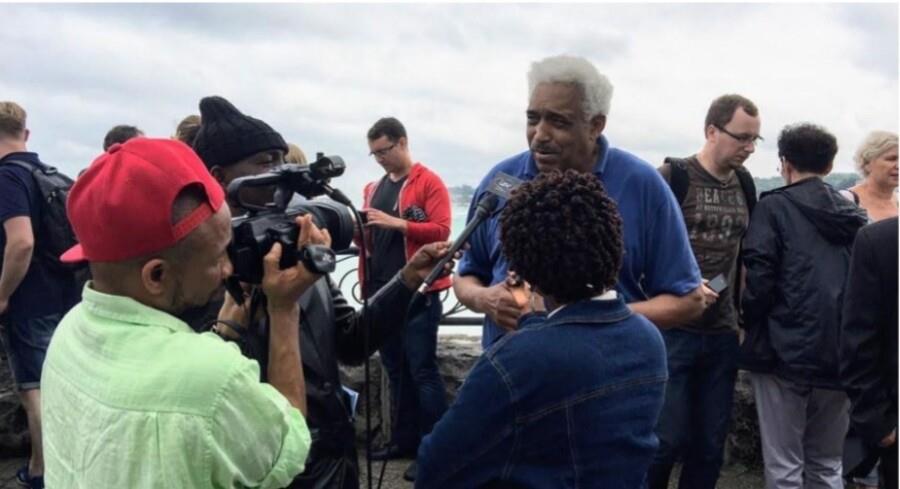 A man speaking into a microphone