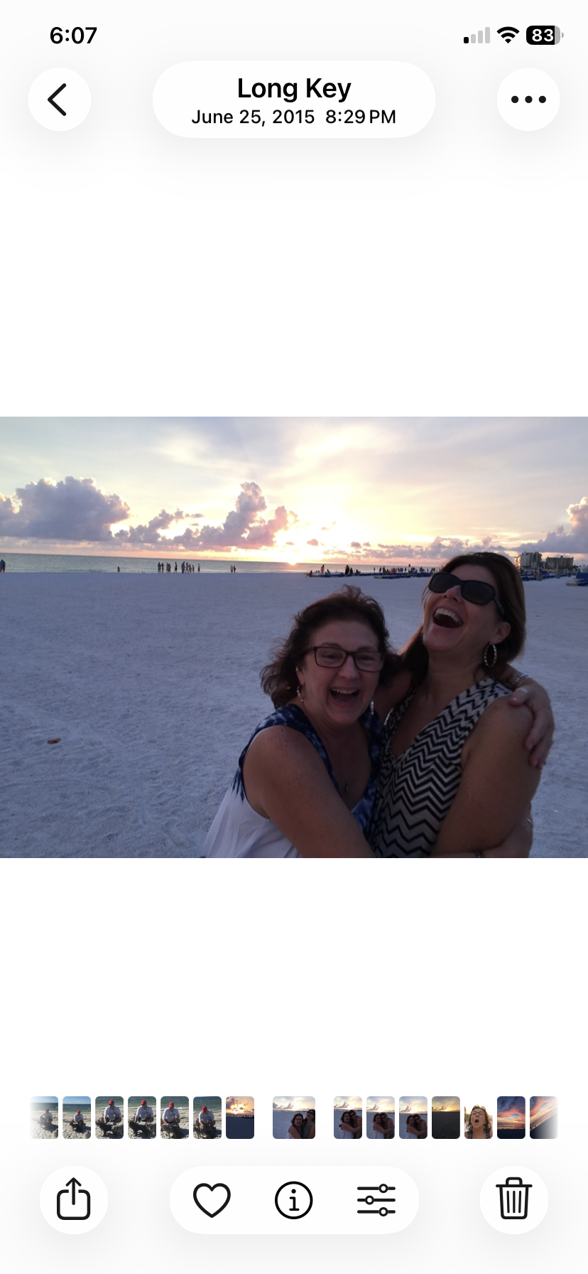 Two women hugging on a beach