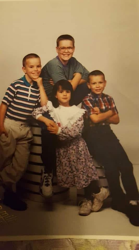 A group of children posing for a photo