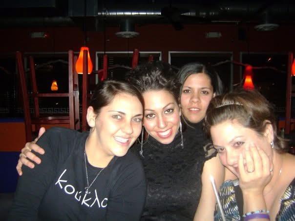 A group of women posing for a photo