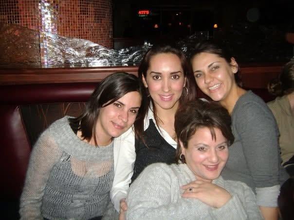 A group of women posing for a photo
