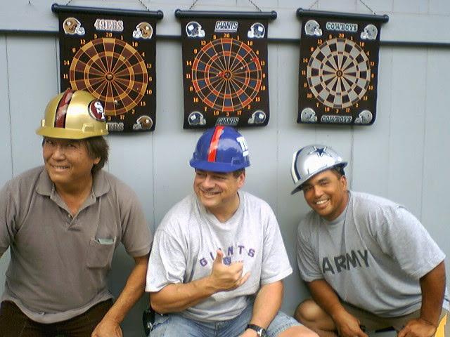 A group of men wearing helmets