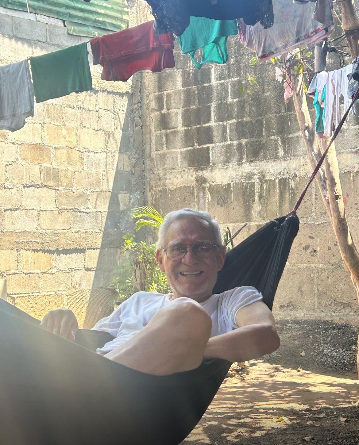 A man sitting in a hammock
