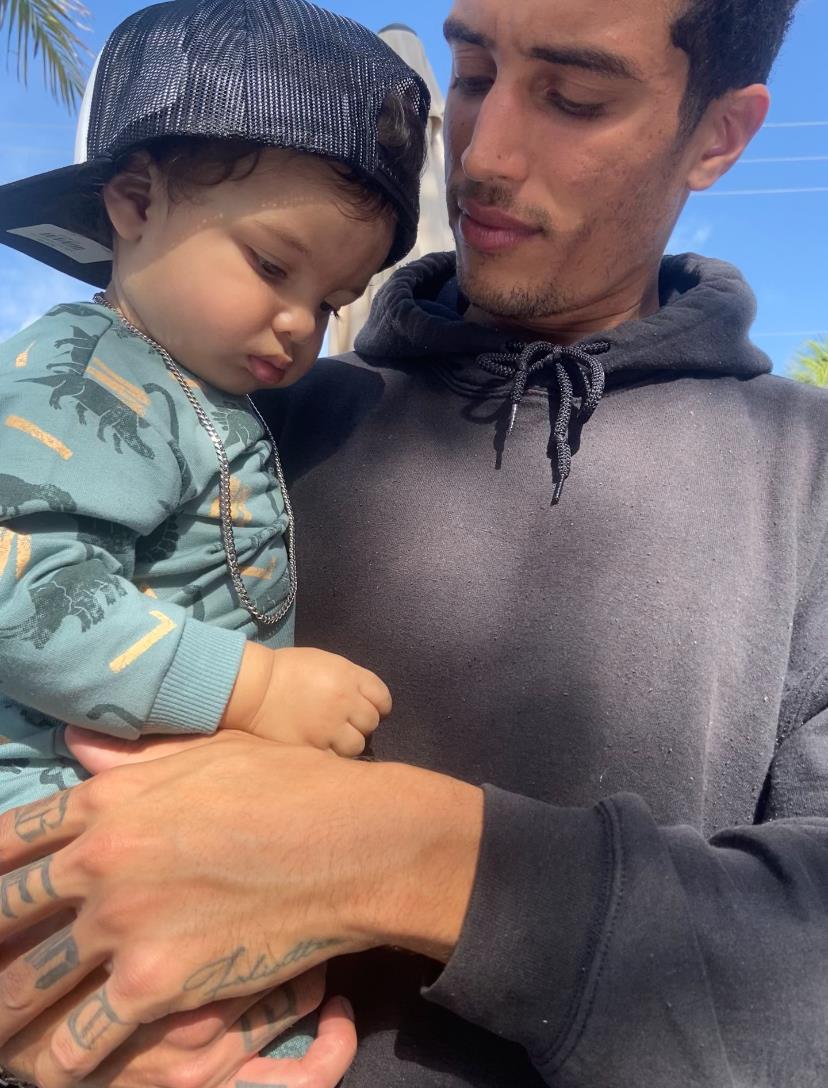 A man holding a baby