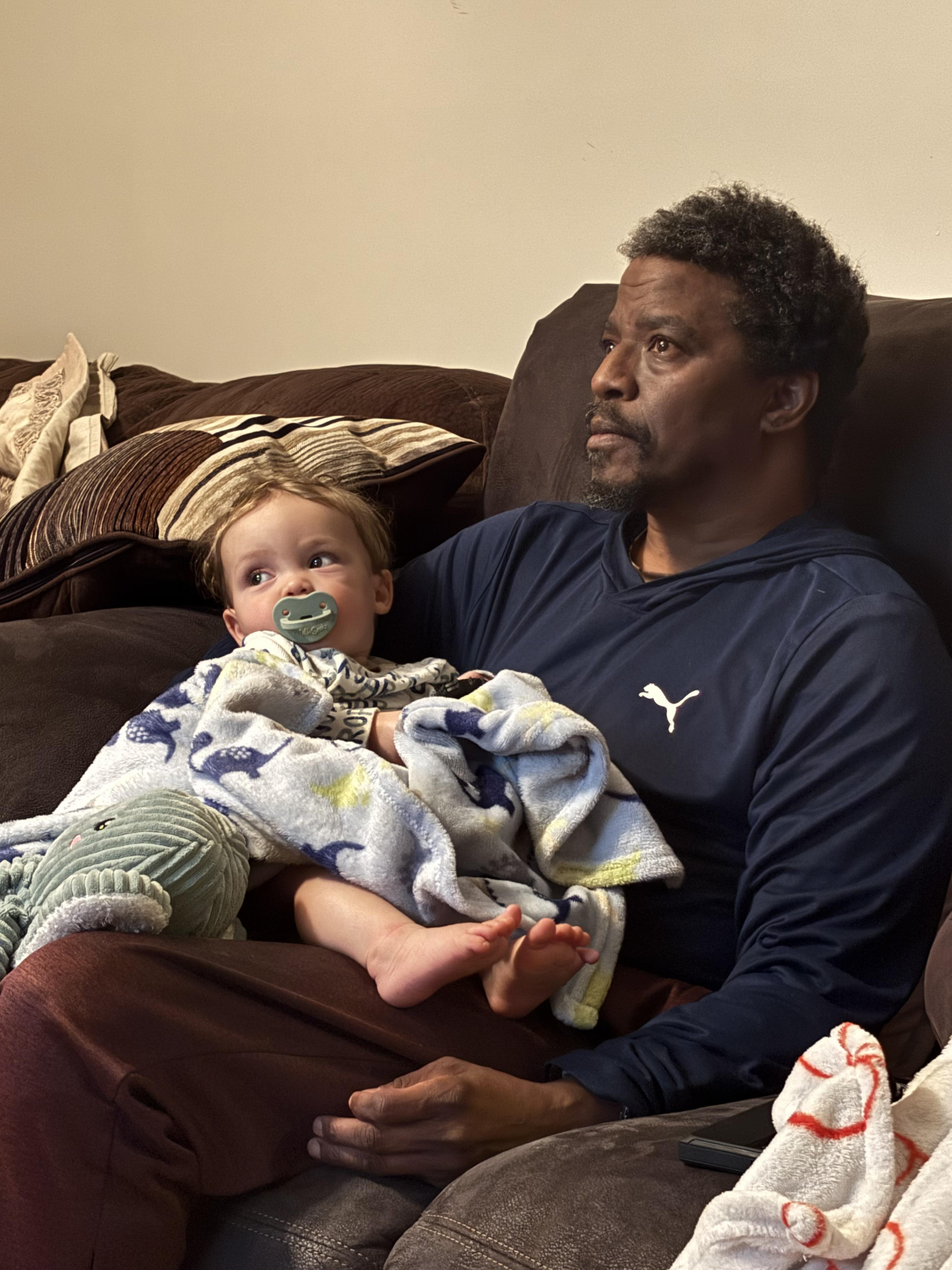 A man holding a baby