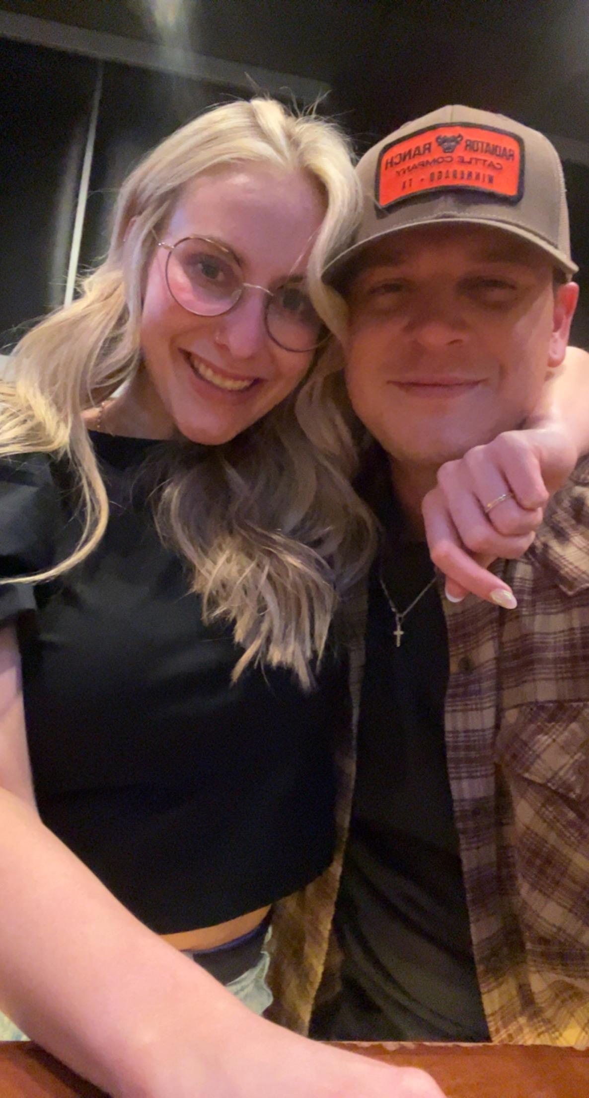 A man and woman taking a selfie