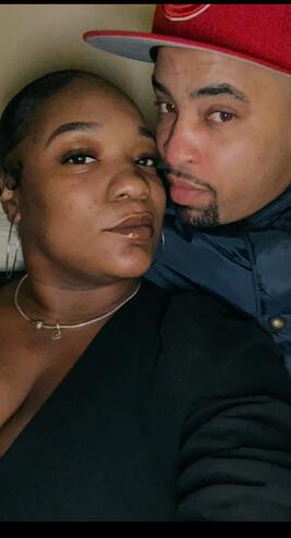 A man and woman taking a selfie