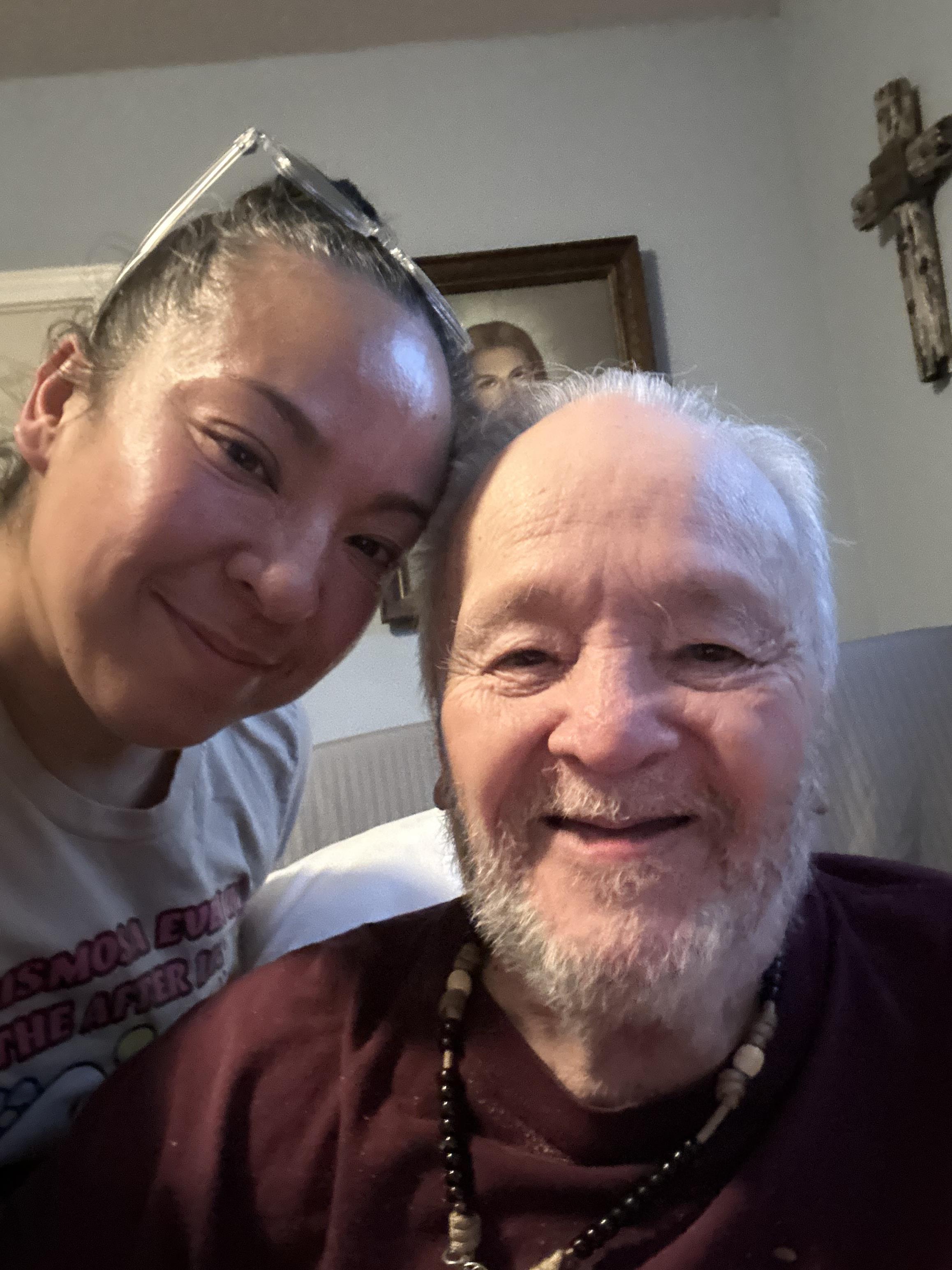 A woman and man taking a selfie