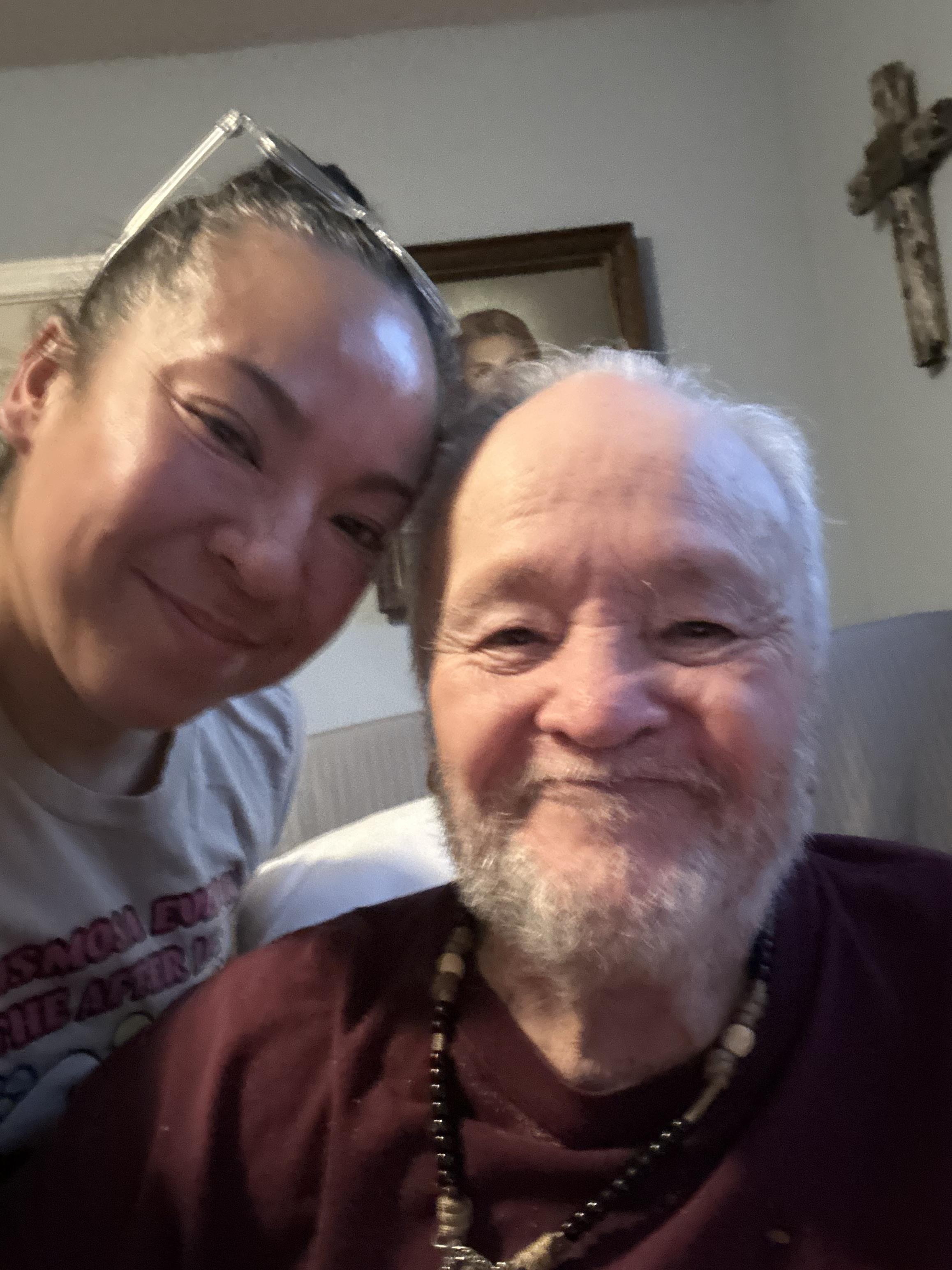 A woman smiling next to a man