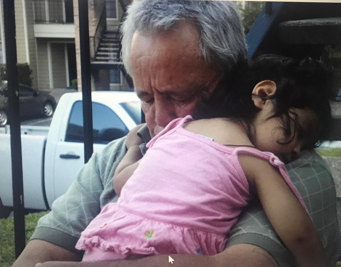 A man holding a baby