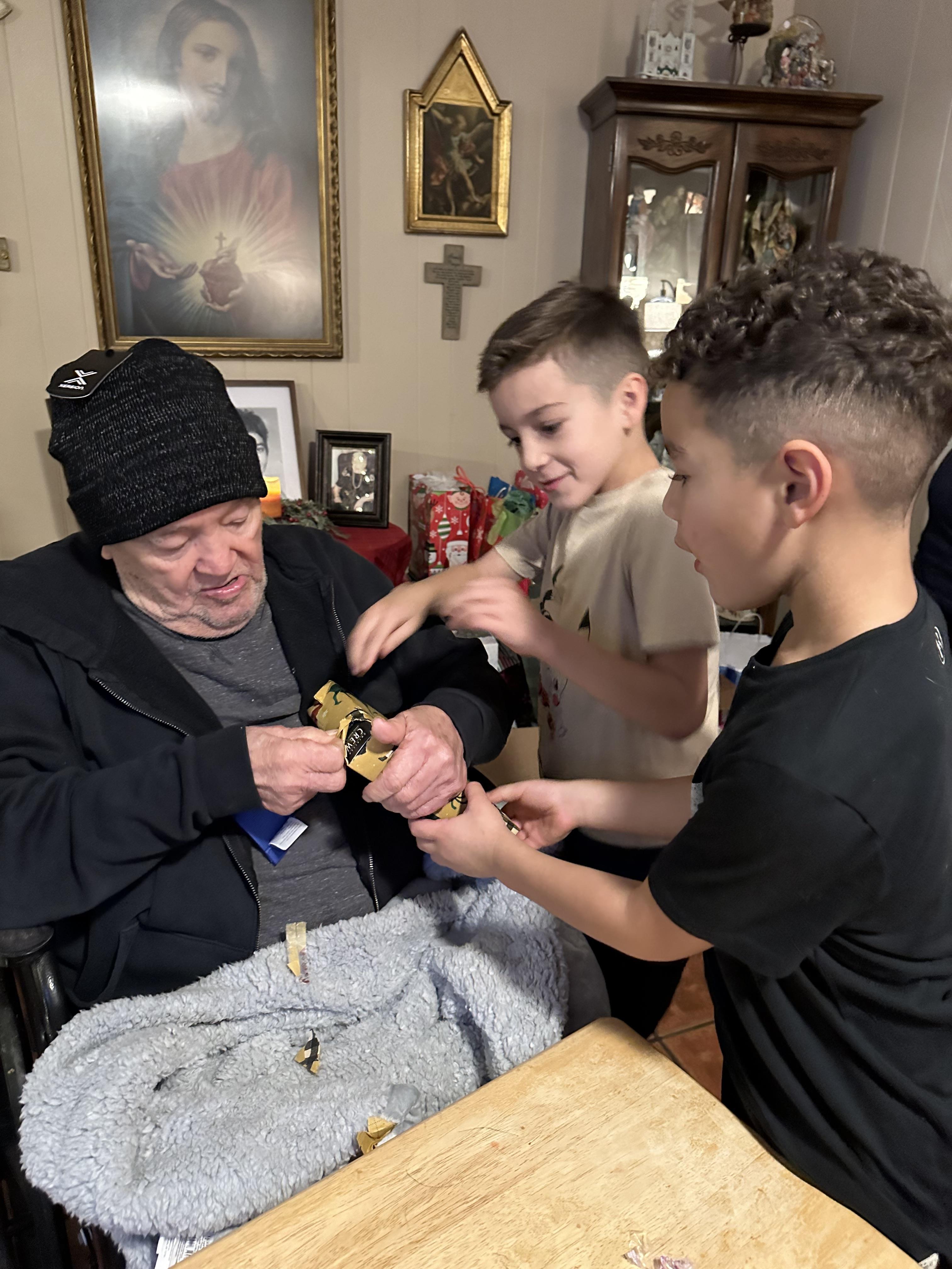 A group of boys around a man