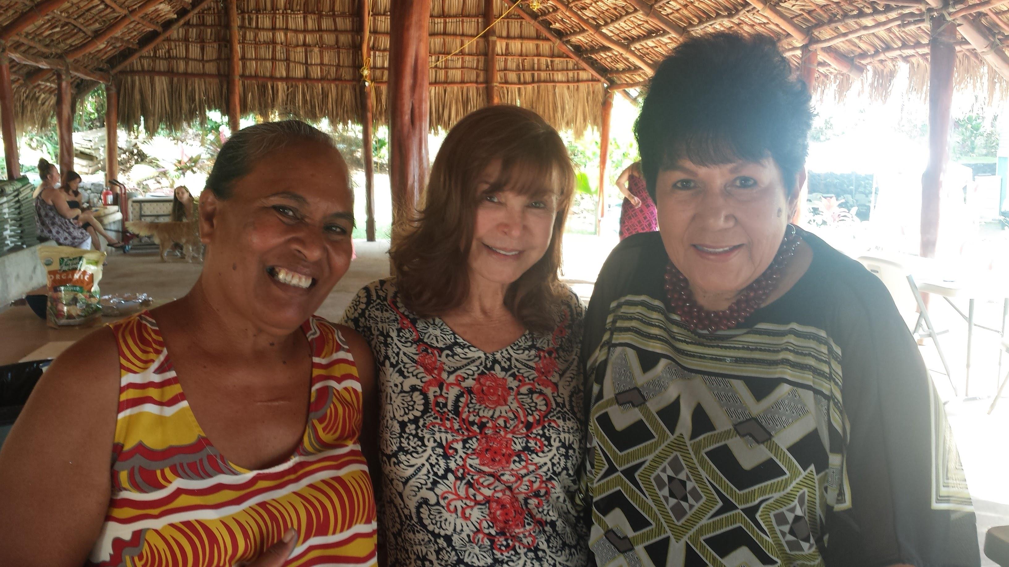A group of women smiling for a photo
