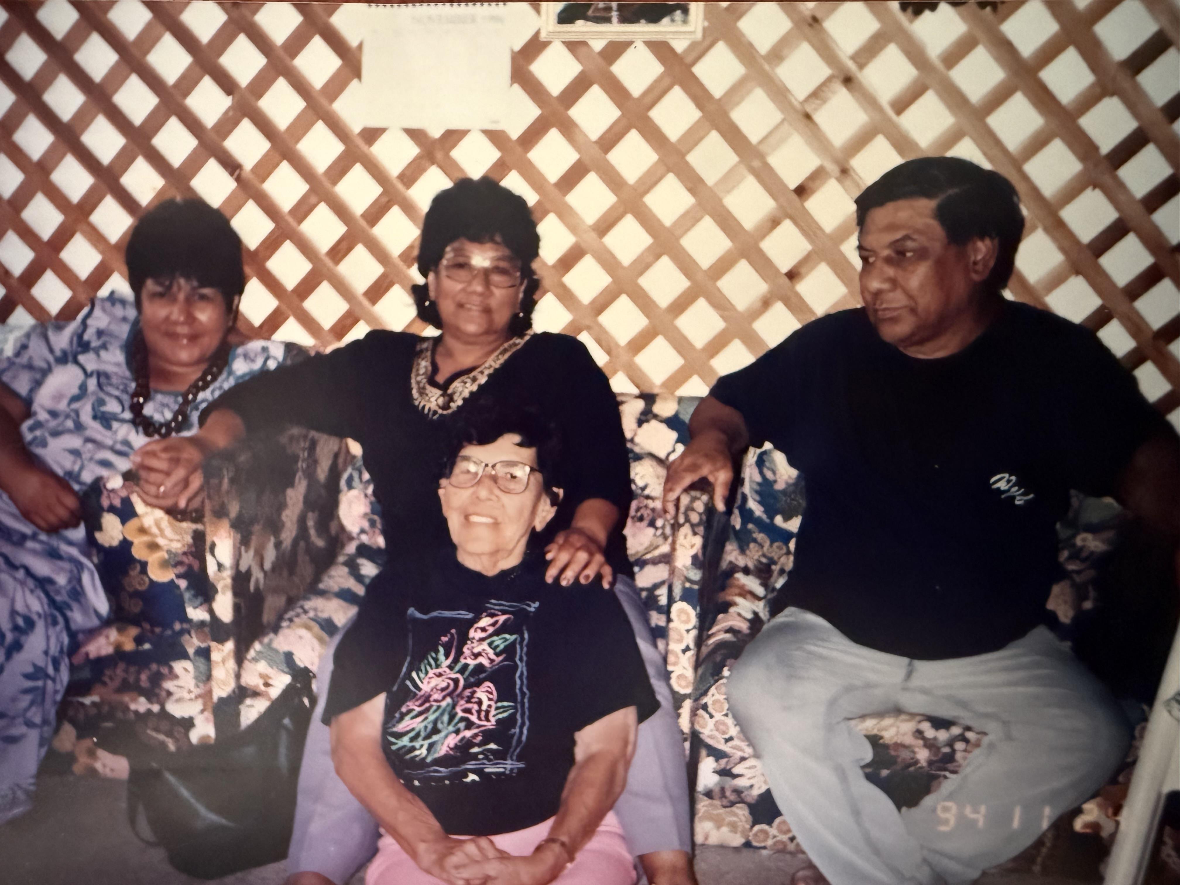 A group of people sitting on a couch