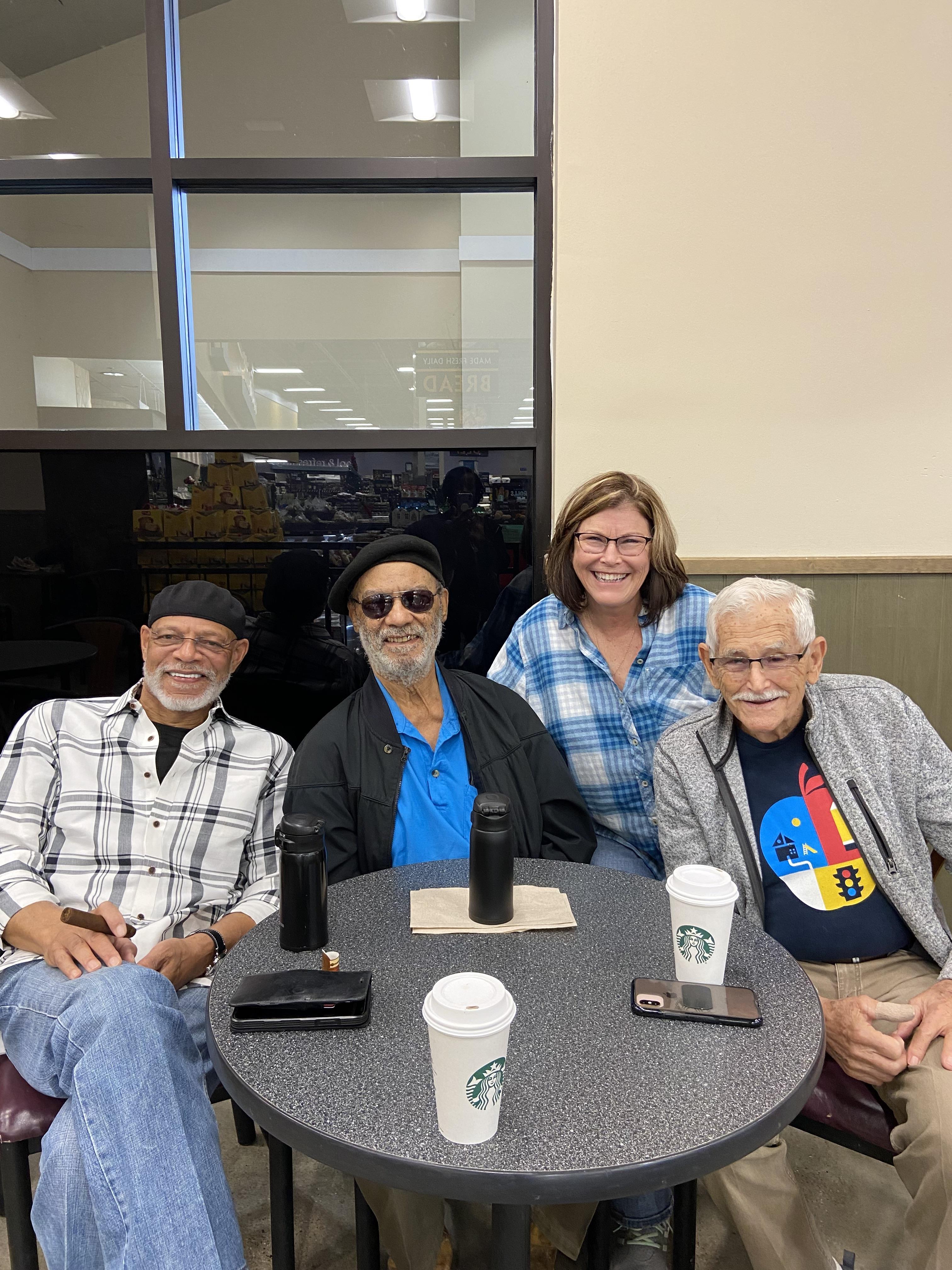 A group of people sitting at a table