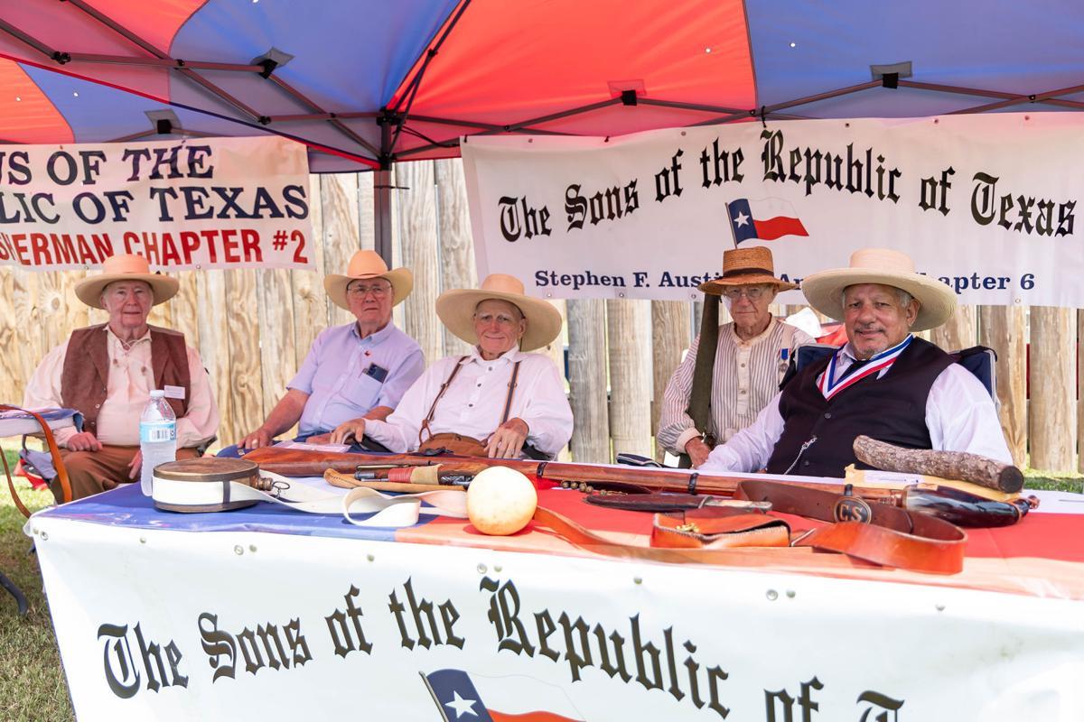 A group of men in cowboy hats