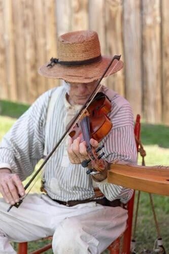 A man playing a violin