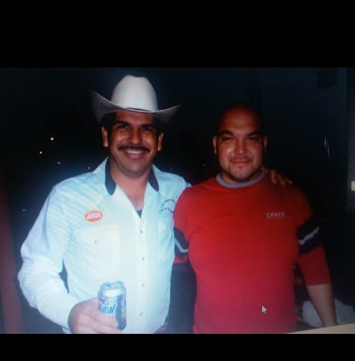 Two men posing for a picture