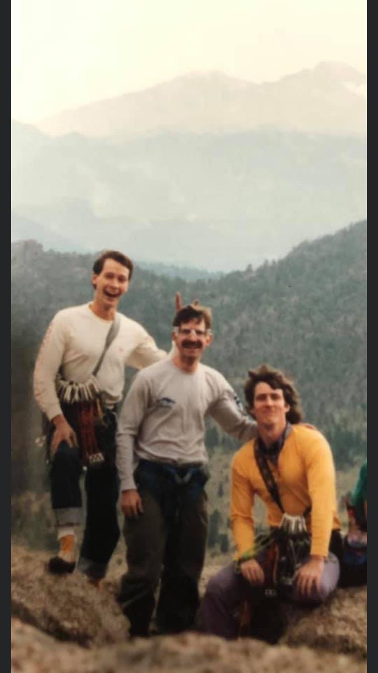 A group of men posing for a picture