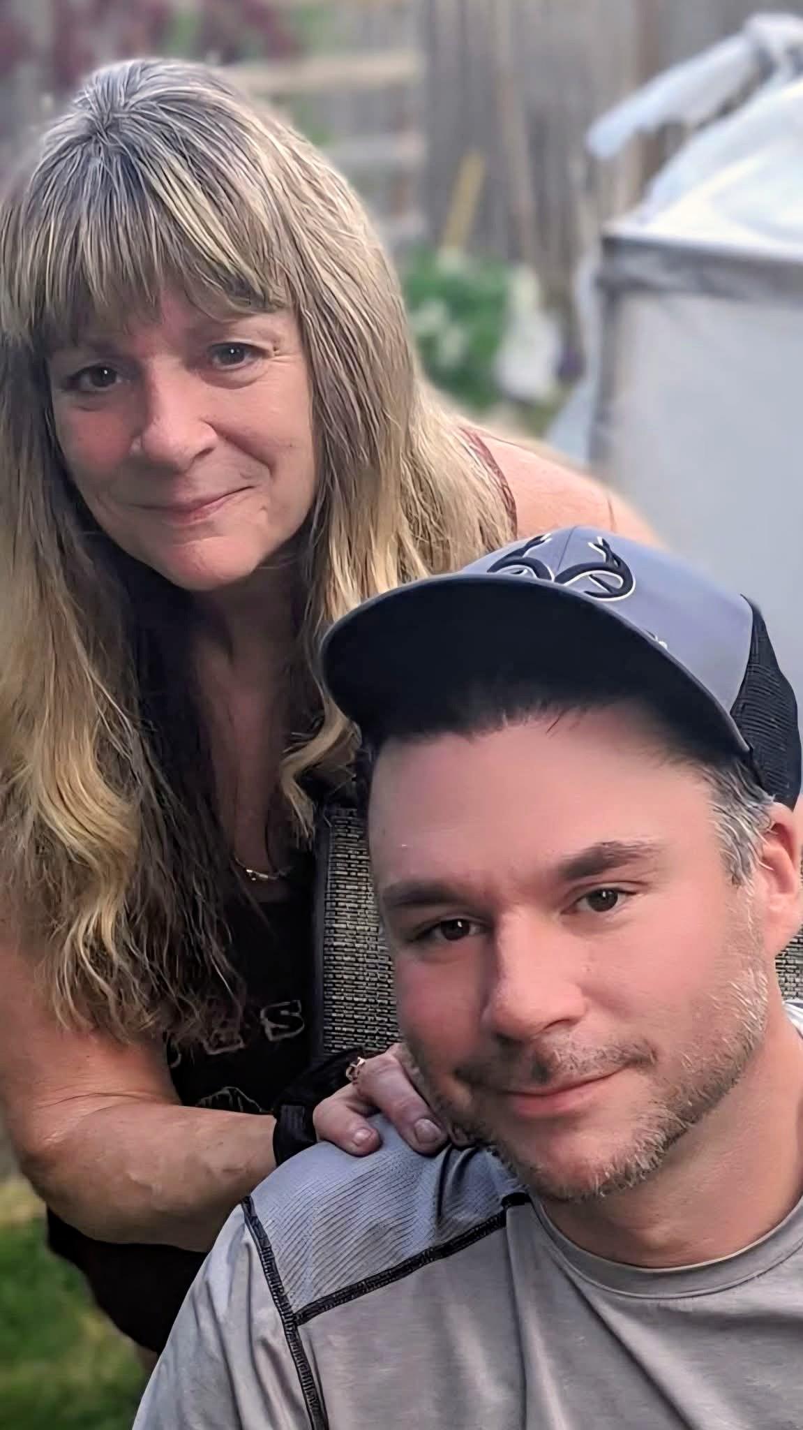 A man and woman taking a selfie