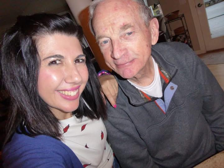A man and woman taking a selfie