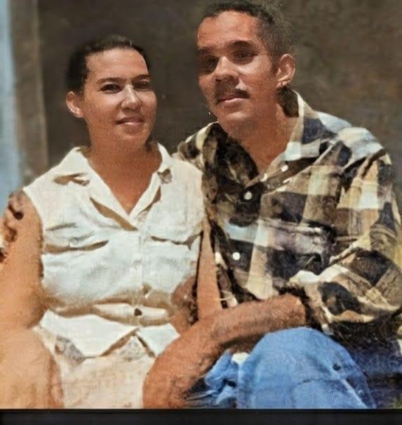 A man and woman sitting together