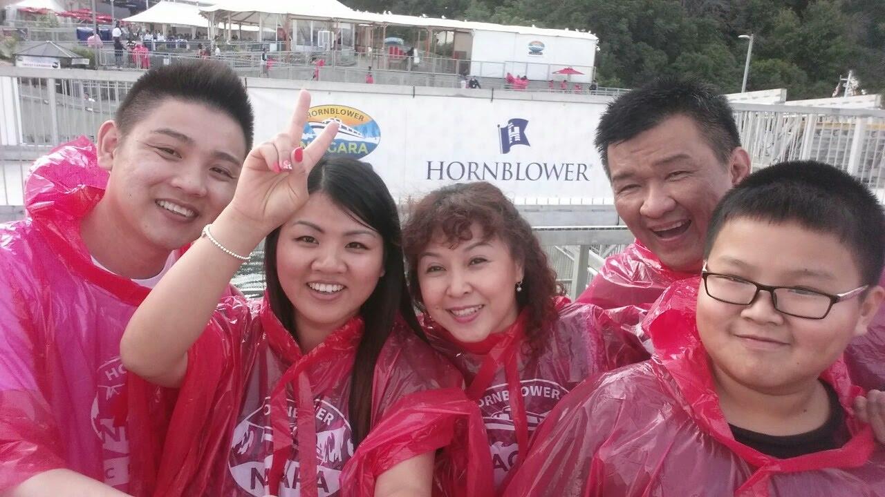 A group of people wearing red raincoats