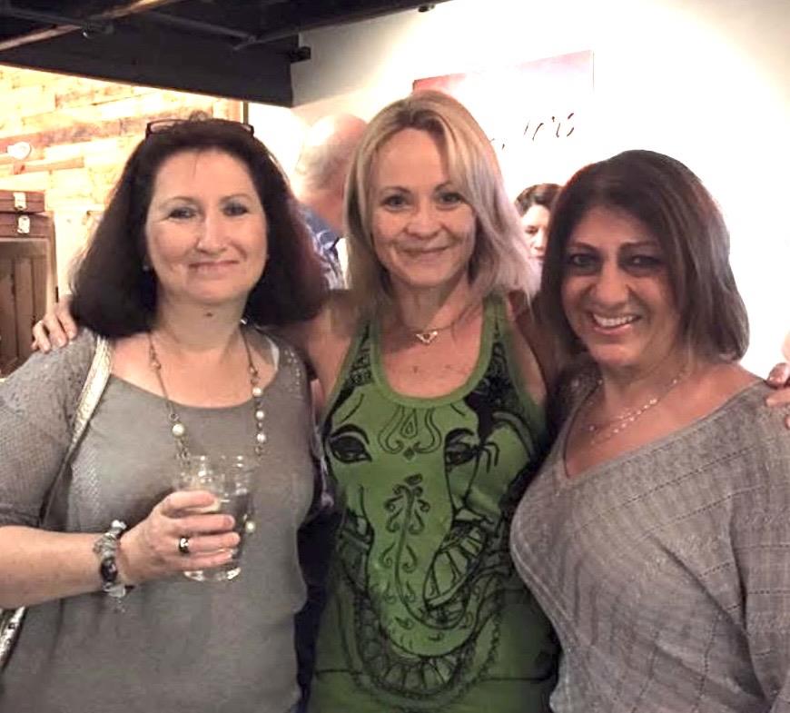 A group of women posing for a picture