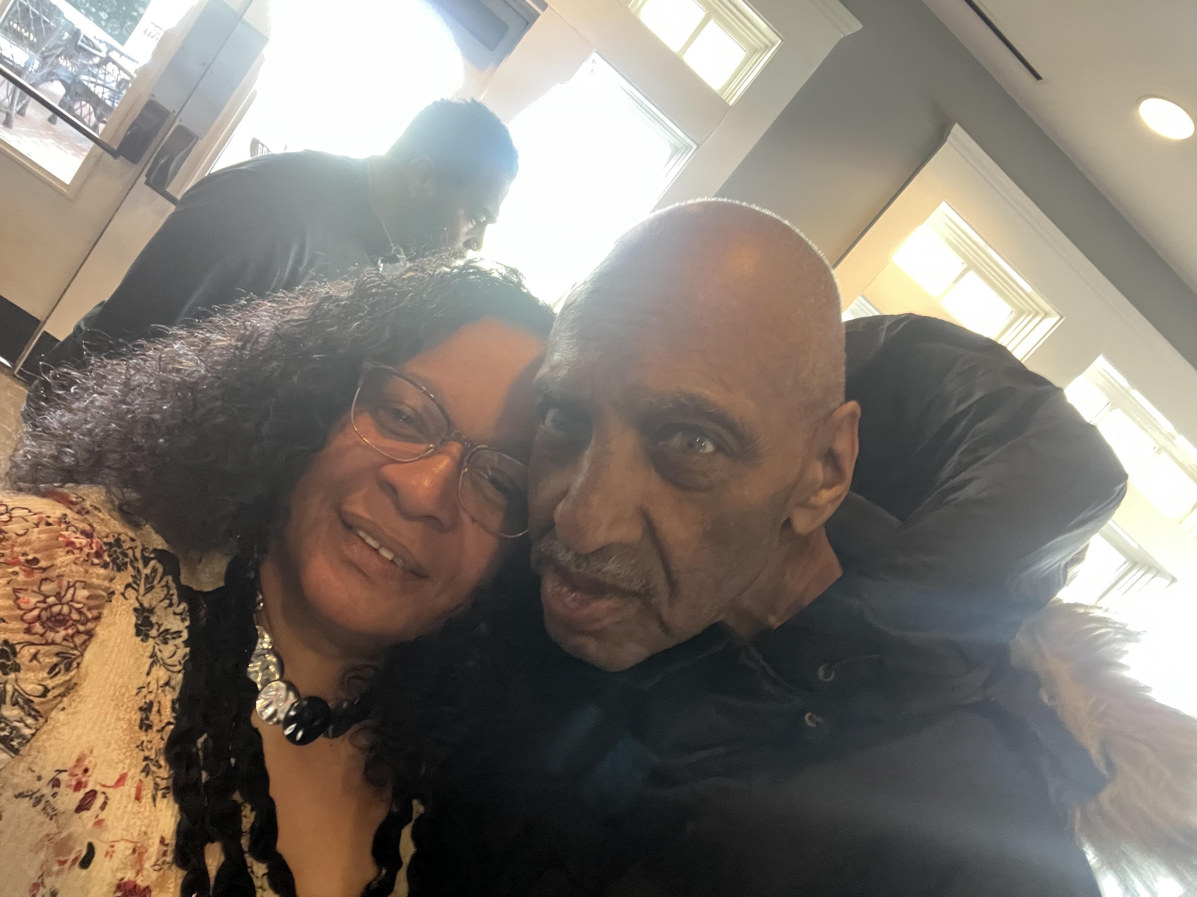 A man and woman taking a selfie