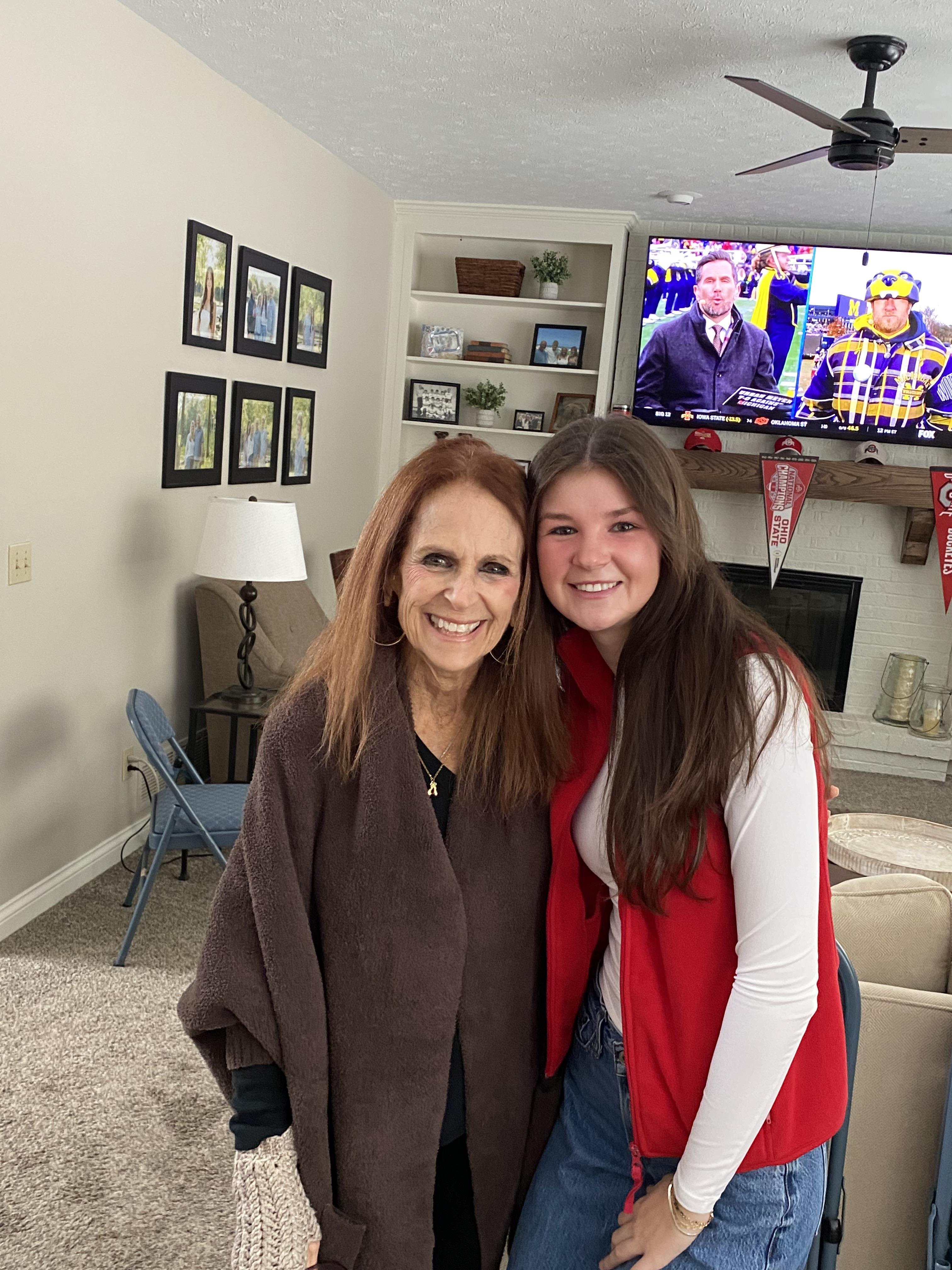 Two women standing in a room