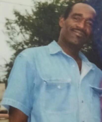 A man in a blue shirt