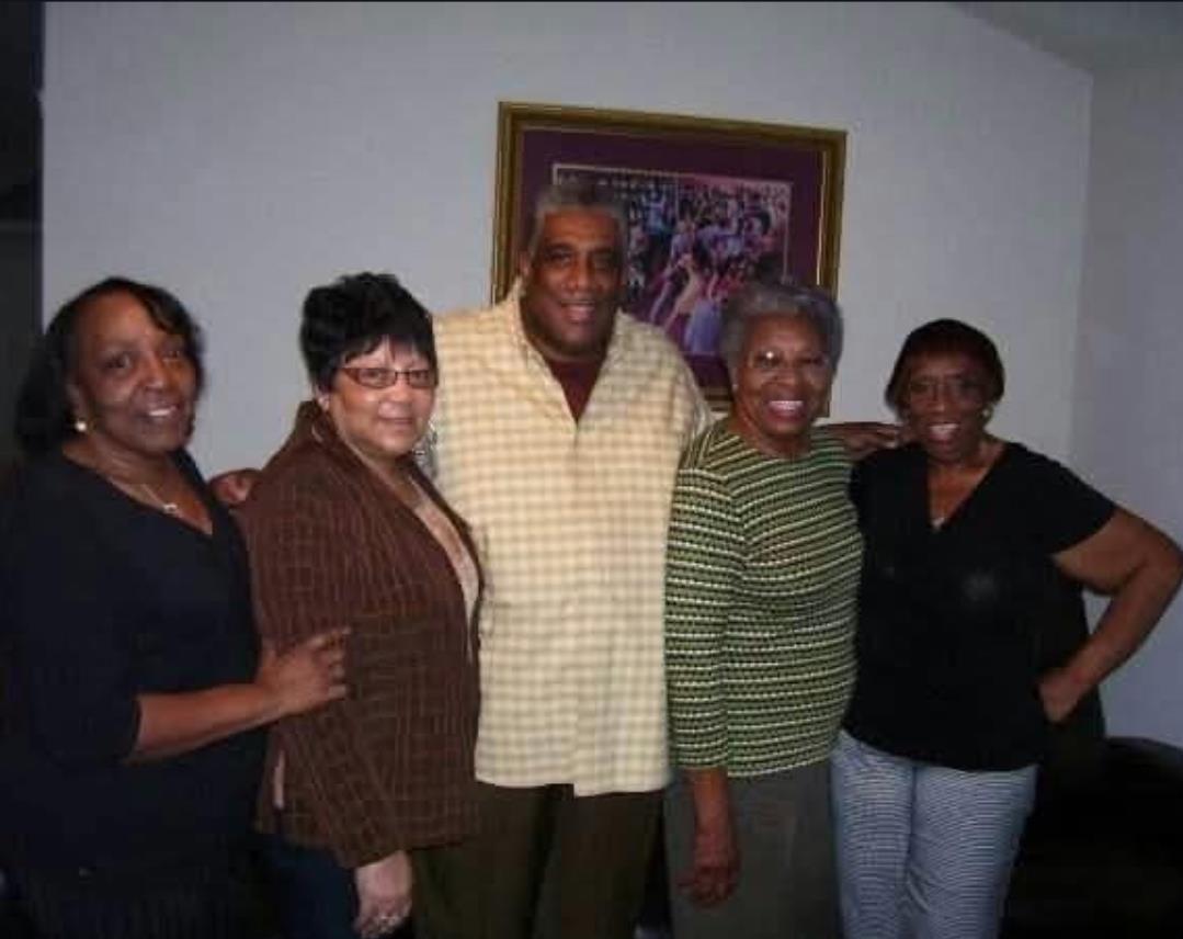 A group of people posing for a photo