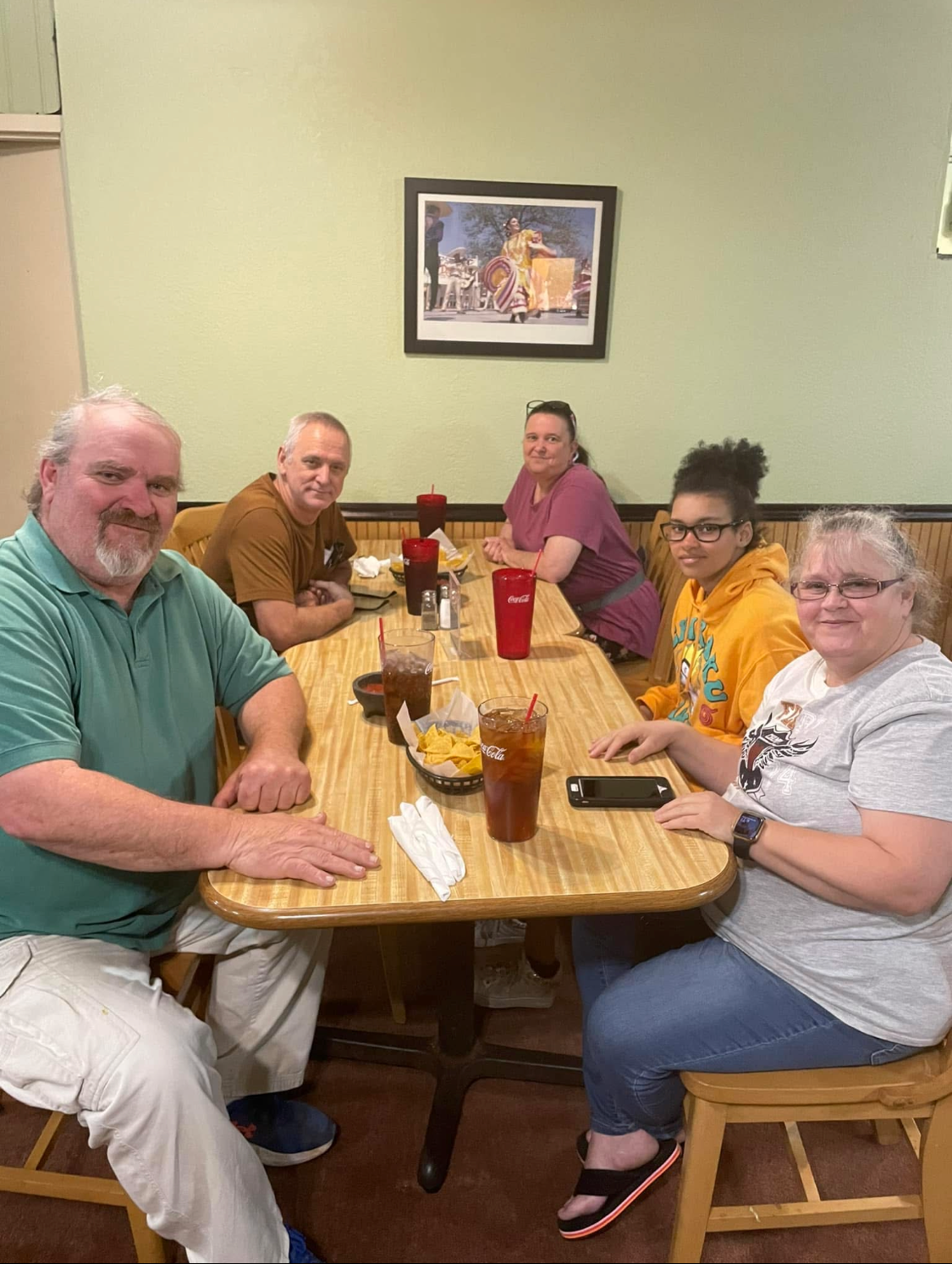 A group of people sitting at a table
