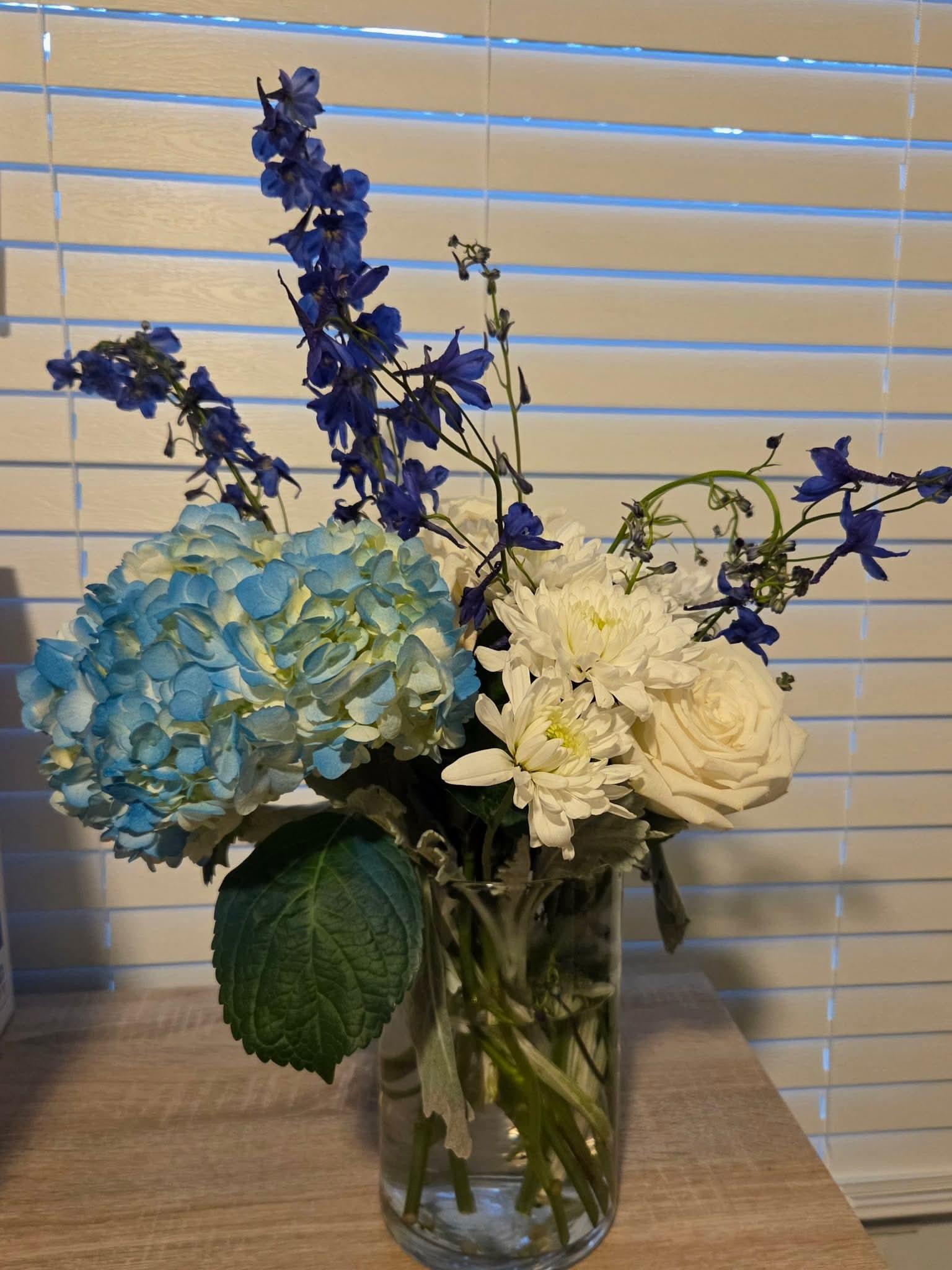 A vase of flowers on a table